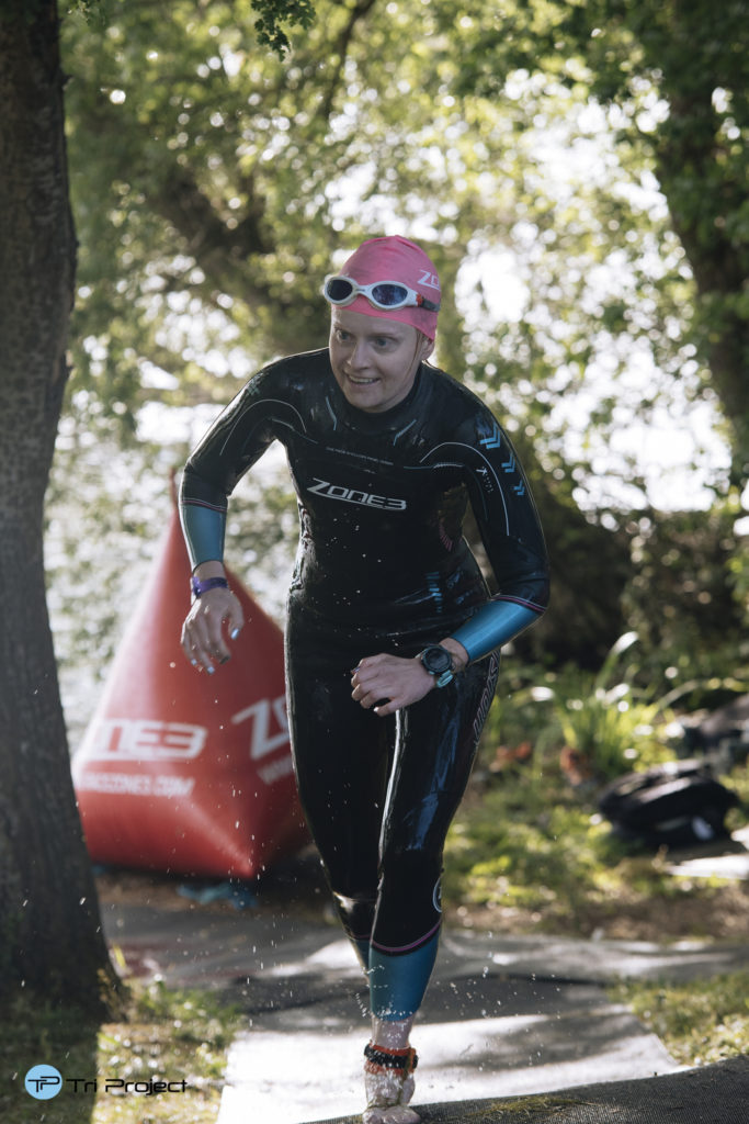 Rebecca at an open water triathlon after stoma surgery 